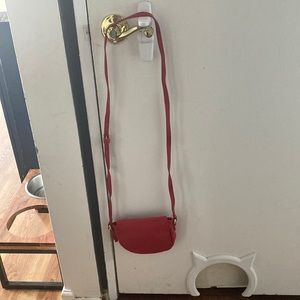 Red cross body bag